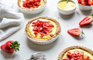 gluten free vegan tarts with vegan lemon custard and fresh berries