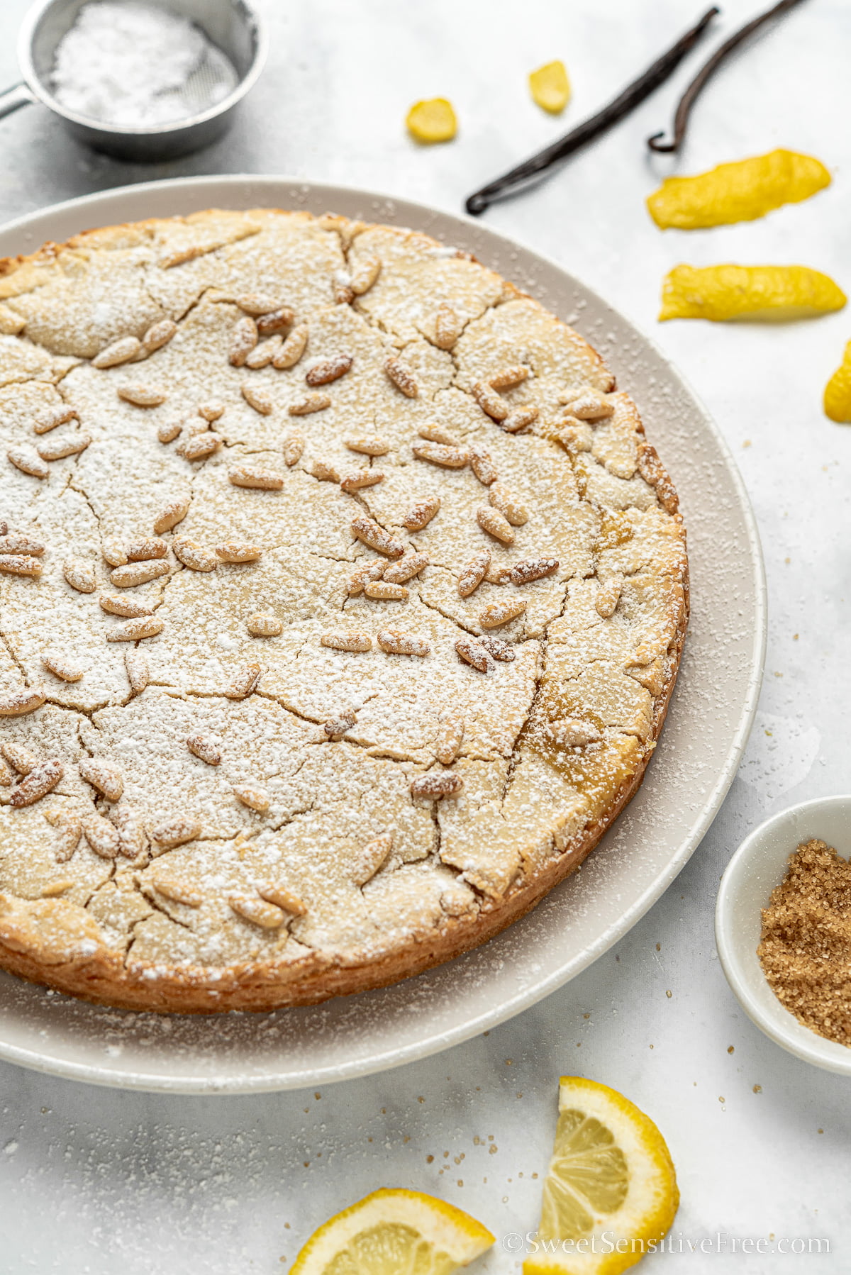 vegan custard pie on a plate with ingredients