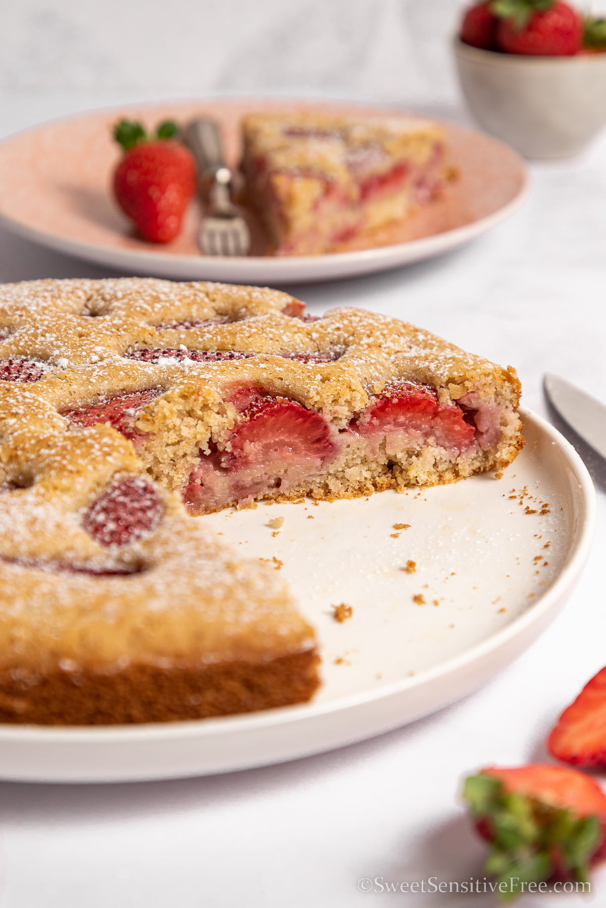 close up of slices gluten free vegan strawberry cake